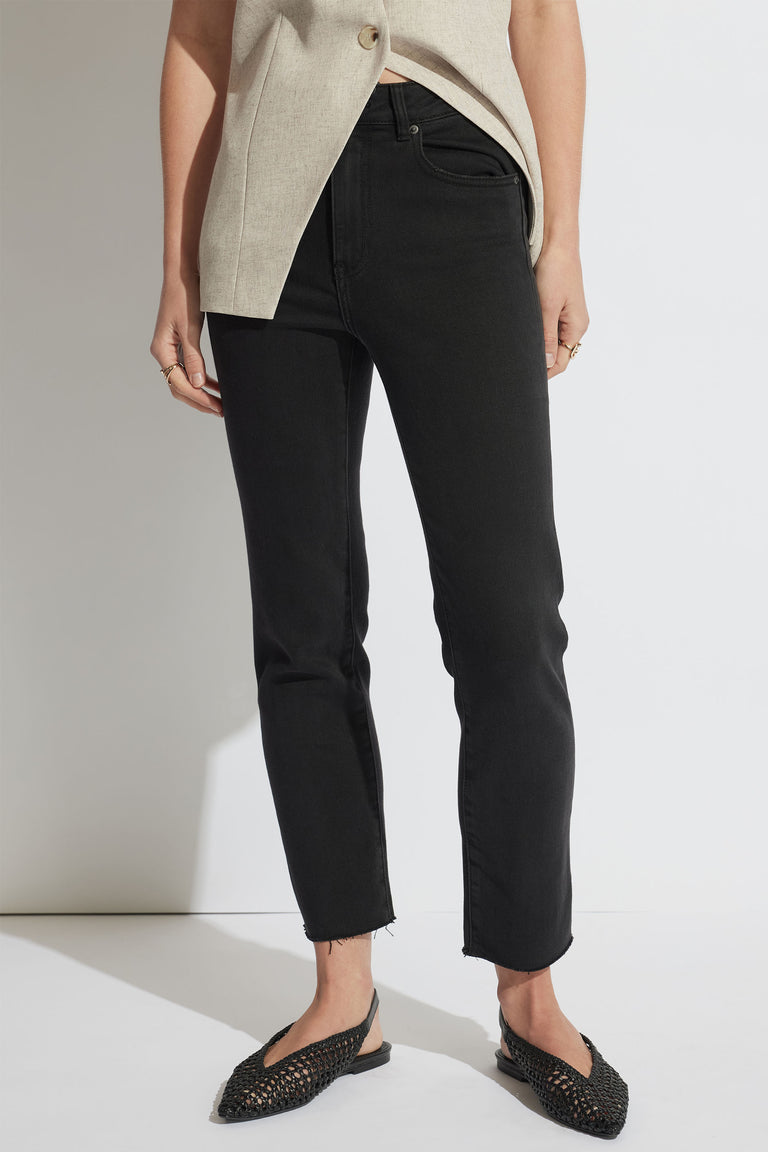 Becky Straight Leg Jean in black denim with high rise, raw hem, ankle length, portrait, gallery position 2.