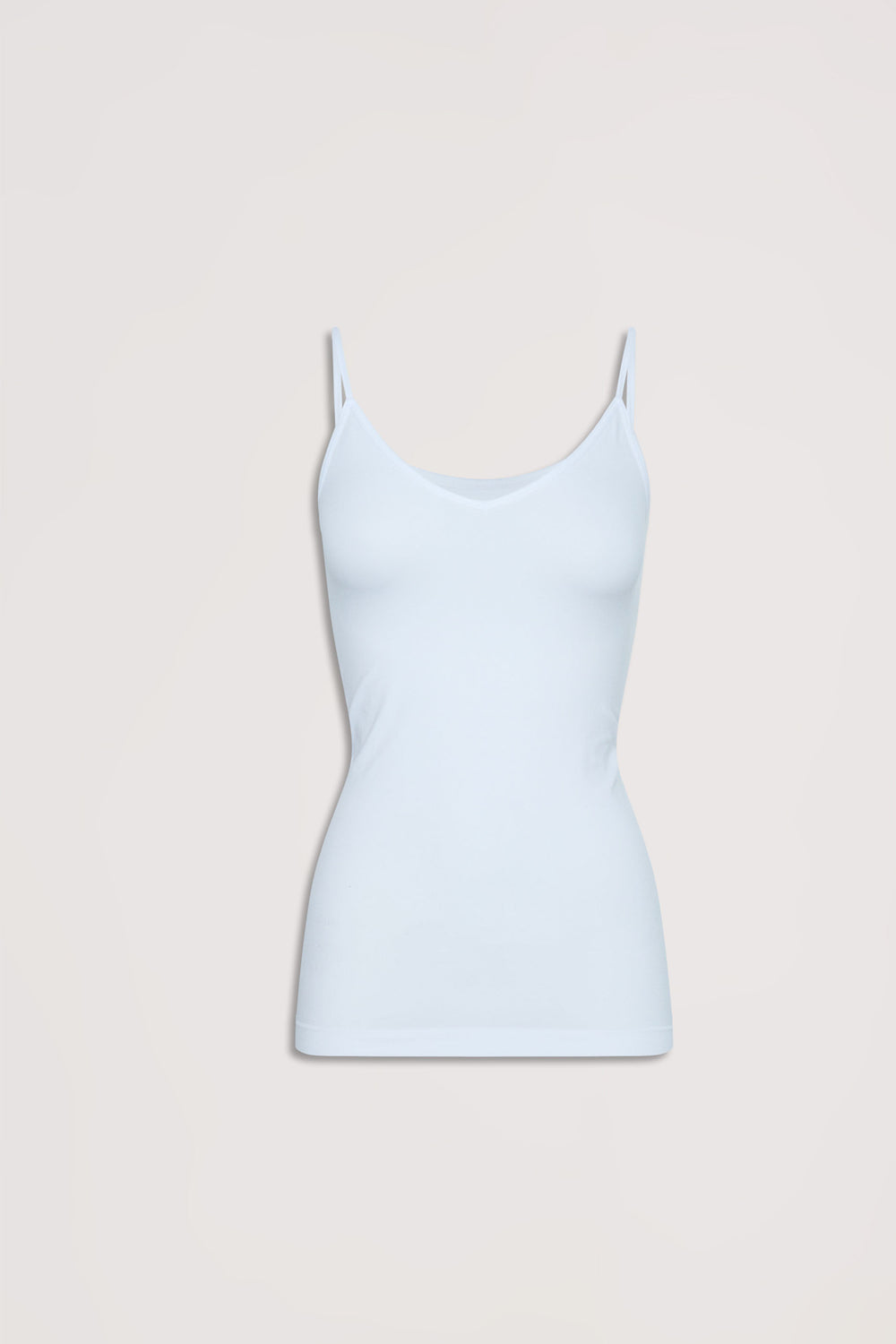 Light blue seamless tank with thin straps, offering a smooth and comfortable fit for effortless layering.