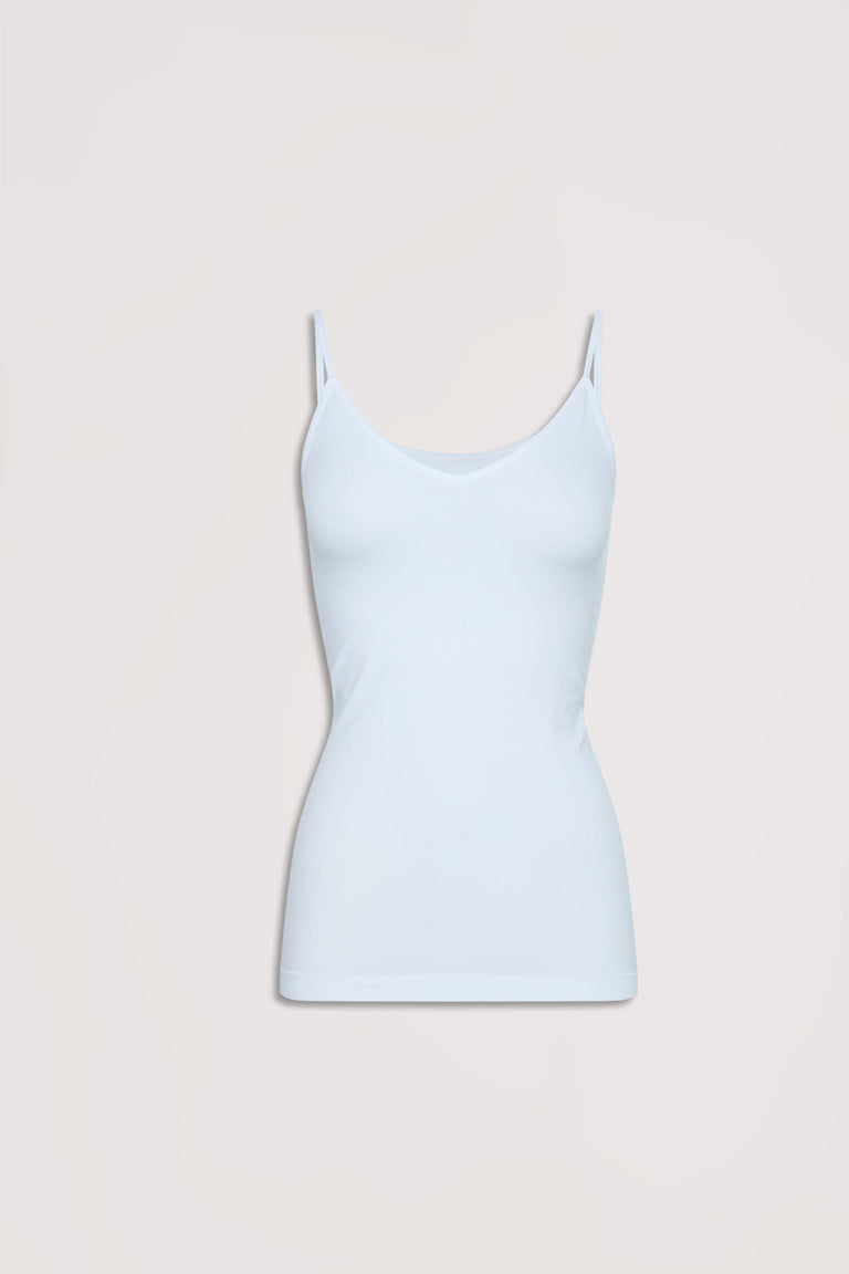 Light blue seamless tank with thin straps, offering a smooth and comfortable fit for effortless layering.