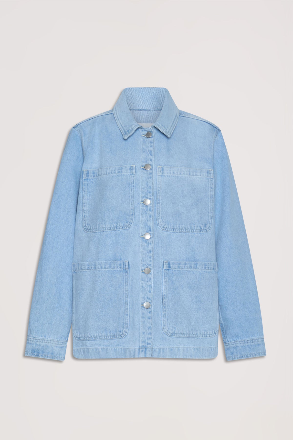 Light wash denim shacket with oversized front pockets and silver snap buttons for a relaxed, casual layer.