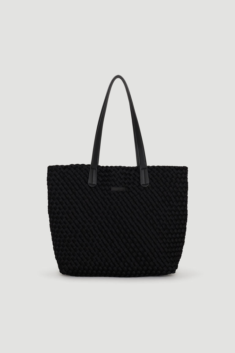 Black woven tote bag with long handles, featuring a textured design for chic, everyday use.