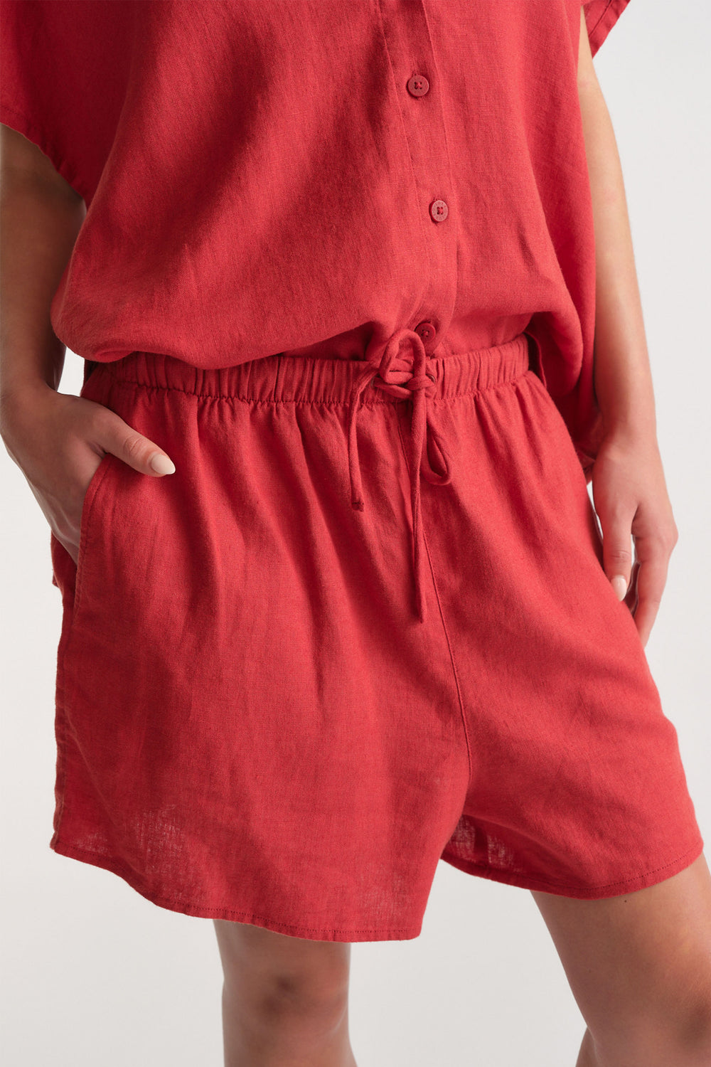 D-Luxe Linen Blend Flip Short in red, lightweight breathable linen with elastic waist and drawstring, gallery position 2 portrait view