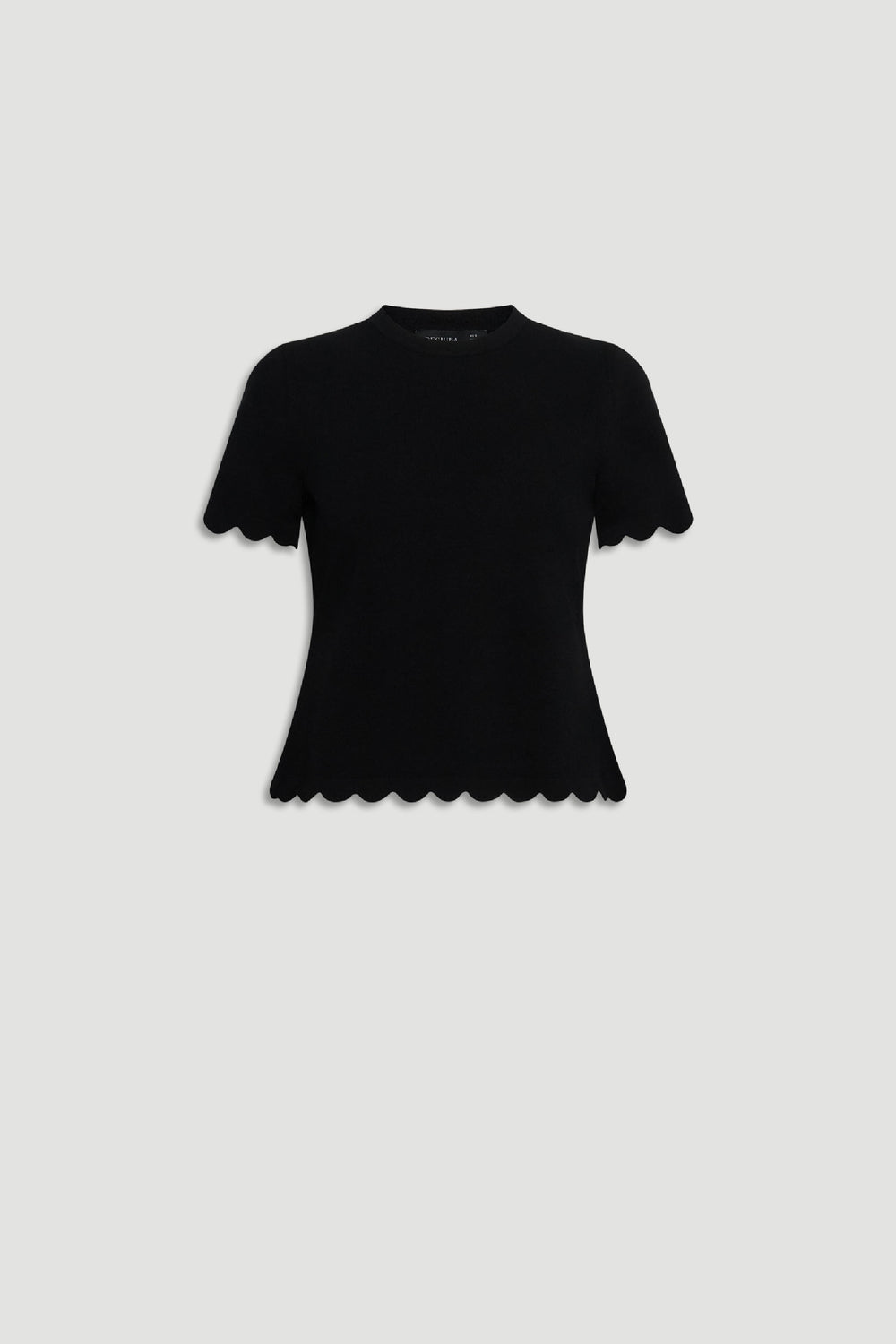 Black short-sleeve knit top with scalloped edges along hem and sleeves for a delicate, stylish finish.