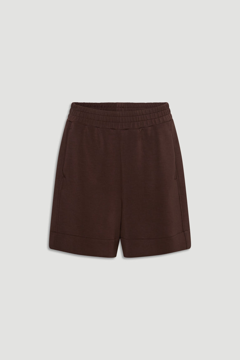 Dark walnut neoprene shorts with elastic waistband and side pockets for a comfortable, modern casual style