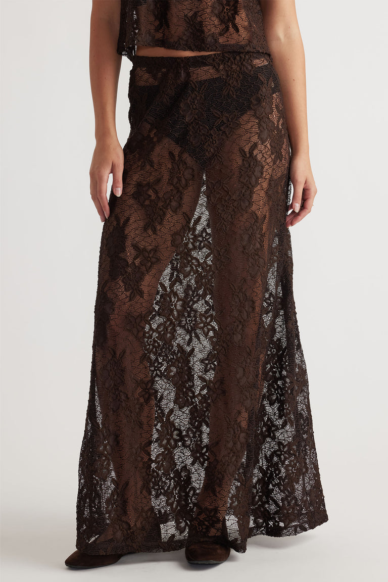 Brown lace maxi skirt with intricate floral pattern, offering an elegant and airy layered silhouette.