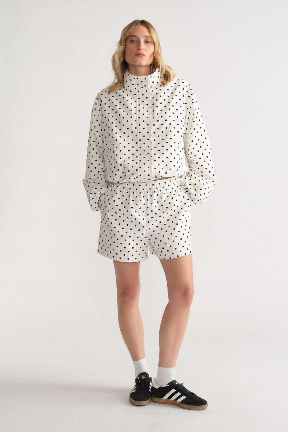 D-Luxe Polka Dot Jacket in white with black dots, featuring a stand collar and relaxed fit by DECJUBA Australian fashion brand