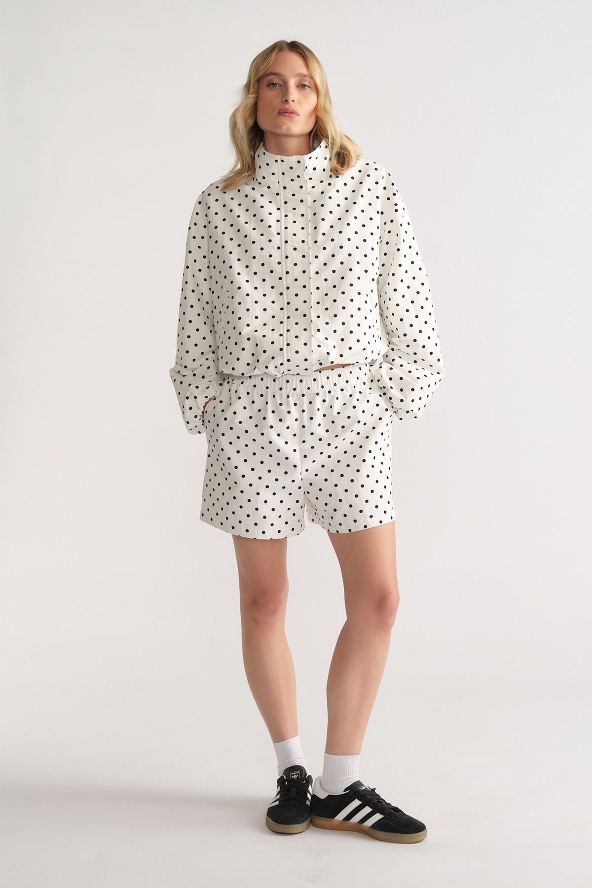 D-Luxe Polka Dot Jacket in white with black dots, featuring a stand collar and relaxed fit by DECJUBA Australian fashion brand