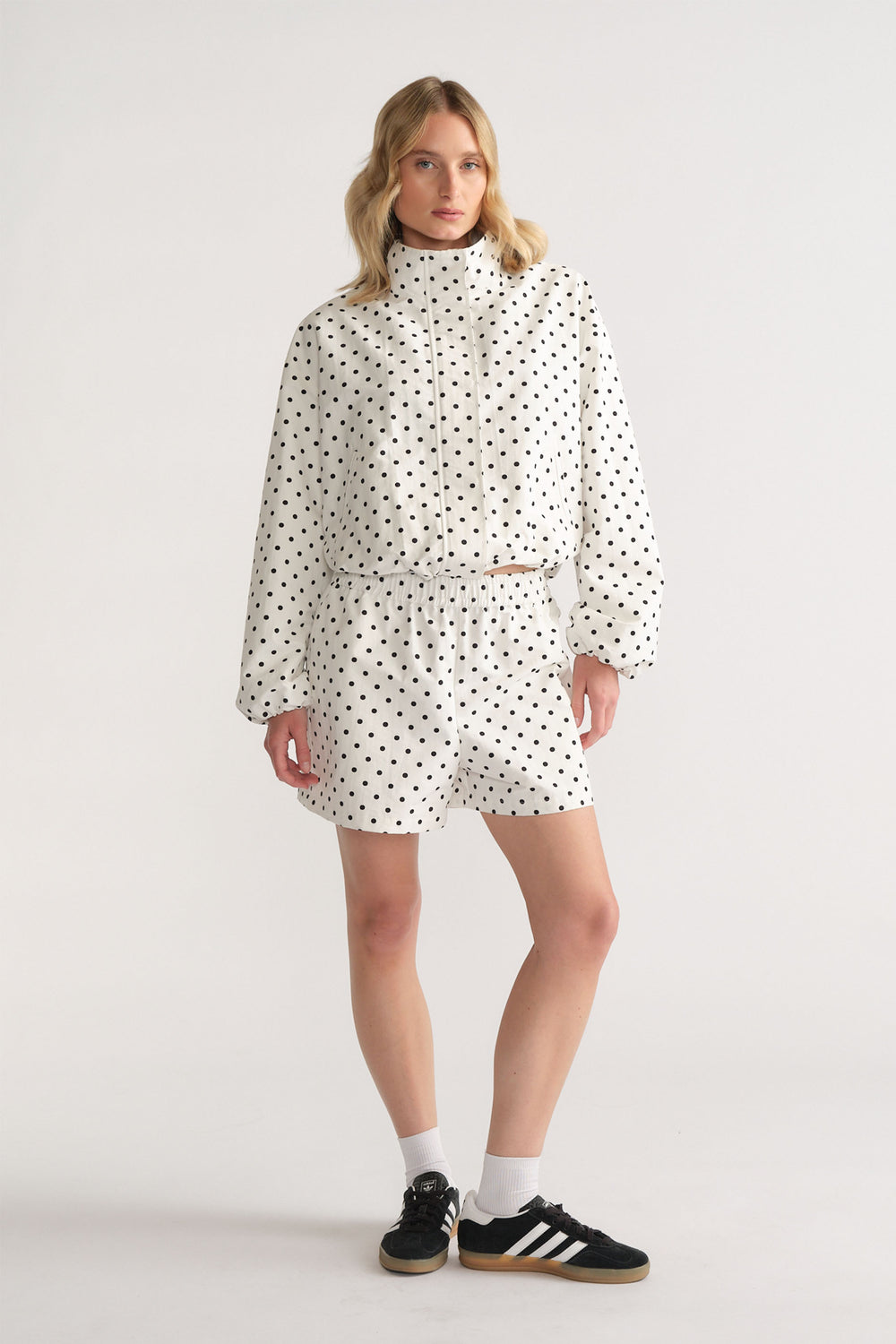 D-Luxe Polka Dot Short in white with black dots, elastic waist and relaxed fit styled with matching jacket by DECJUBA Australian brand