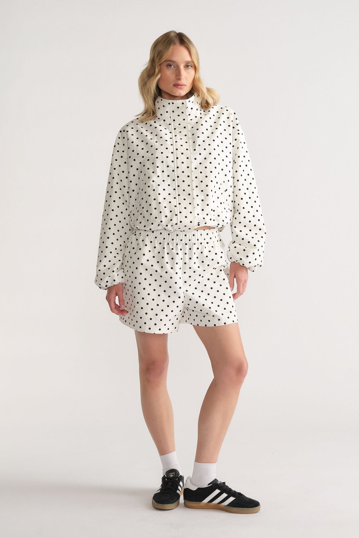 D-Luxe Polka Dot Short in white with black dots, elastic waist and relaxed fit styled with matching jacket by DECJUBA Australian brand