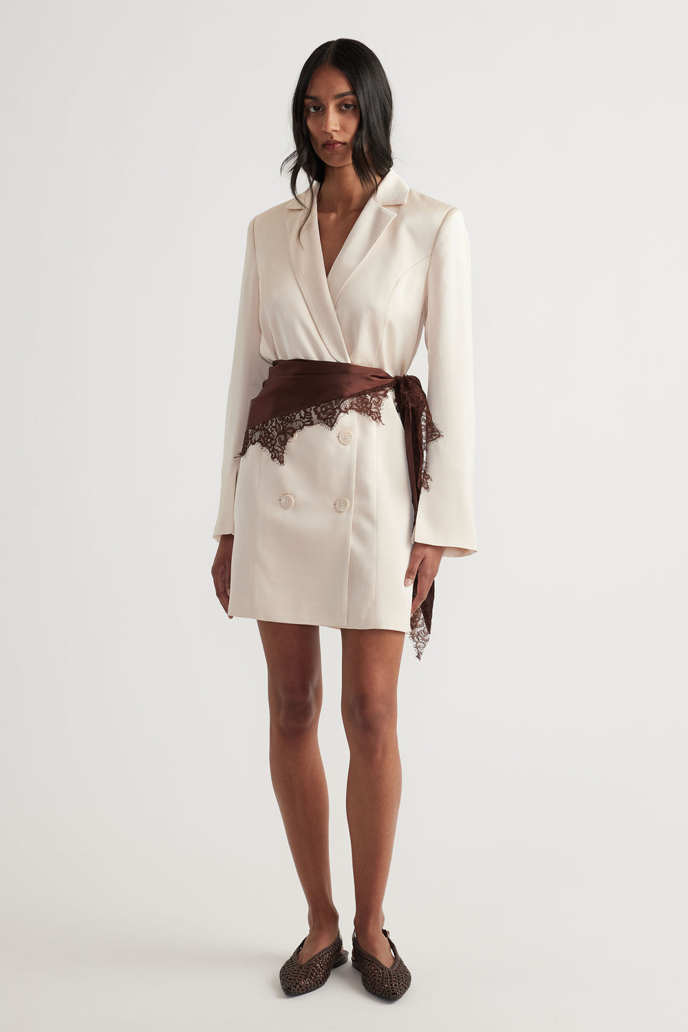 Model styled in cream blazer dress with brown Sienna Lace Scarf tied at waist, featuring elegant lace trim by DECJUBA Australian brand