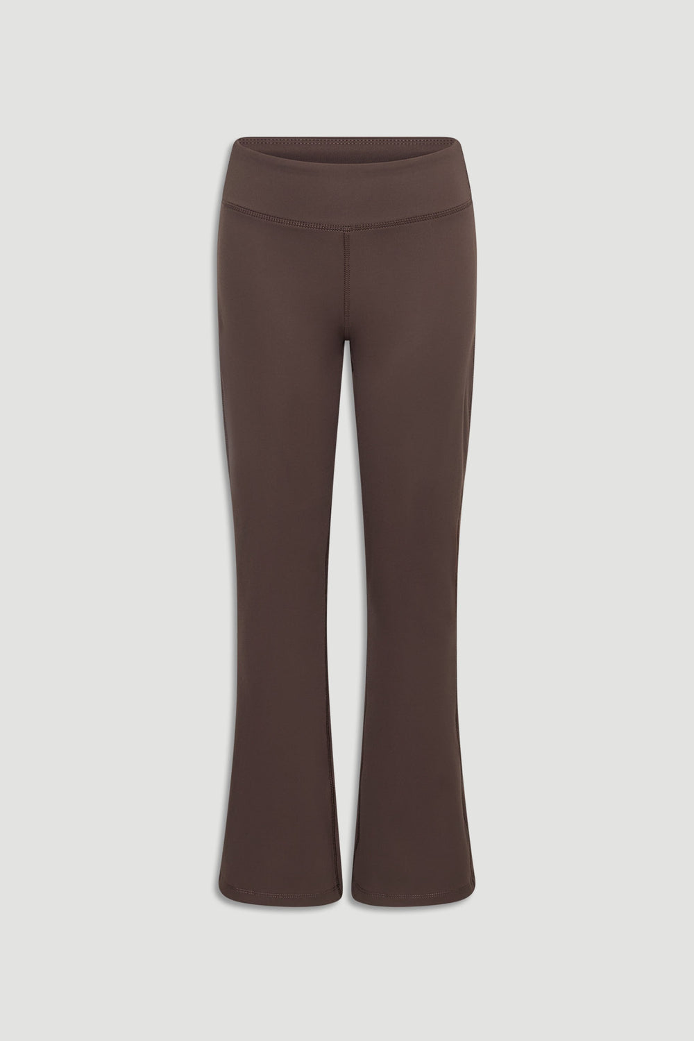 Front view of mocha-colored girls yoga pants featuring a fitted waist and slight flare for comfort and style