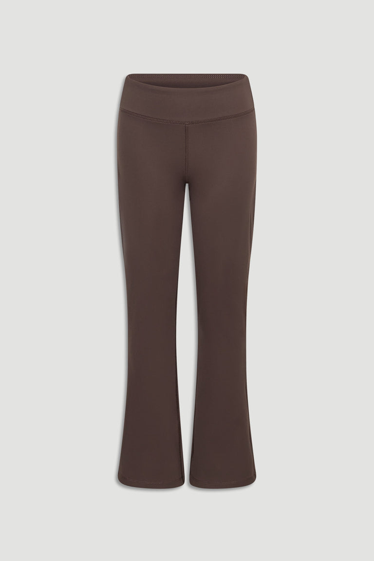 Front view of mocha-colored girls yoga pants featuring a fitted waist and slight flare for comfort and style