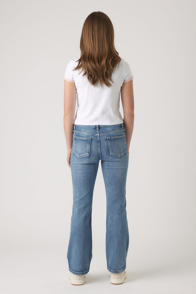 Girls Cropped Ringer Tee in white paired with classic blue denim jeans, styled for a casual everyday look by DECJUBA Australian brand