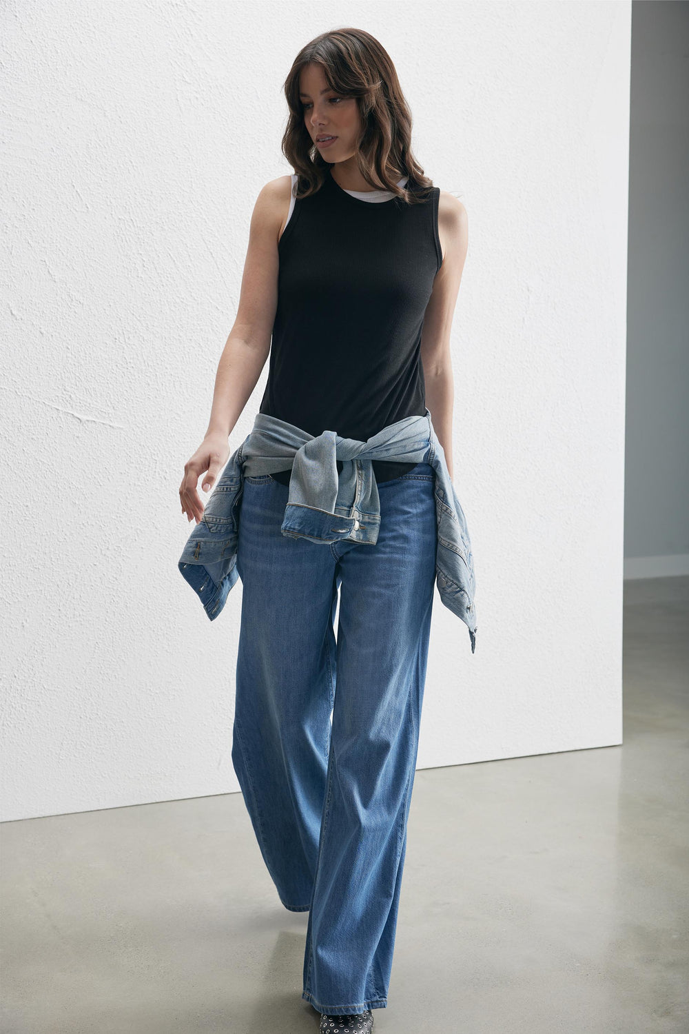 Pollie Soft Rib Tank styled with wide-leg denim pants and a tied denim jacket, gallery position 2, portrait orientation.