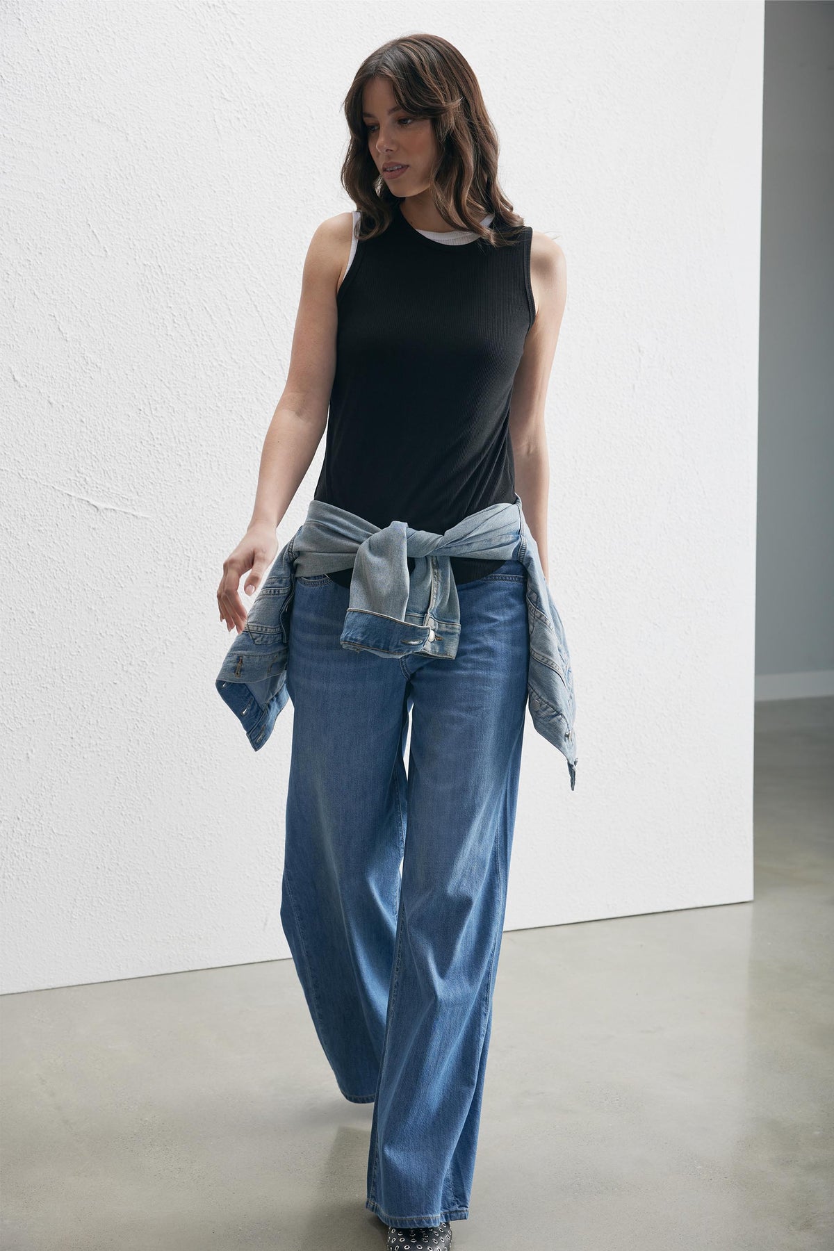 Pollie Soft Rib Tank styled with wide-leg denim pants and a tied denim jacket, gallery position 2, portrait orientation.