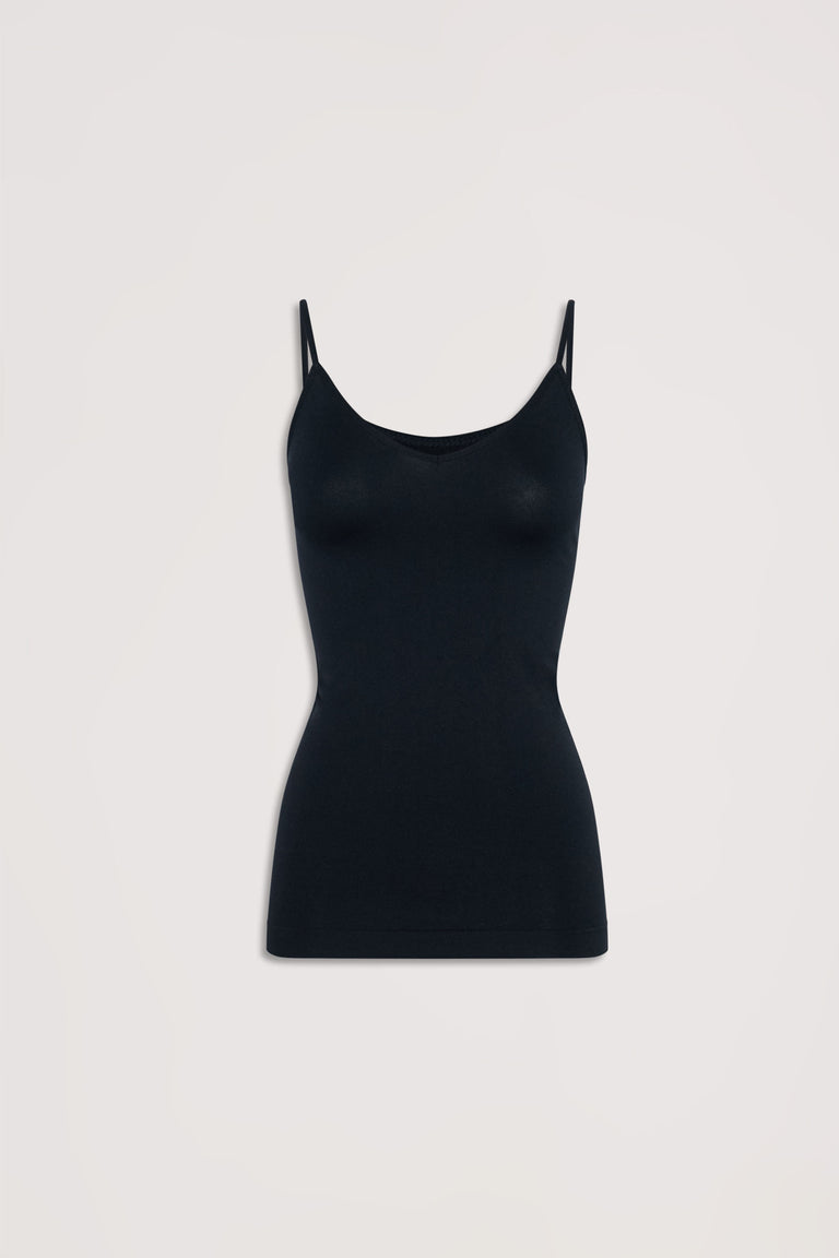 Black seamless tank top with thin straps, designed for a sleek and comfortable everyday fit.