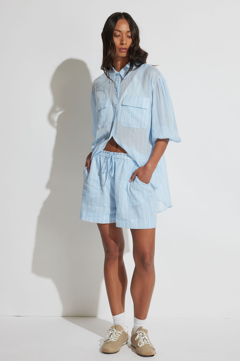 Brooke Ramie Short in light blue striped linen with elastic waistband and side pockets, shown in gallery position 1 portrait view