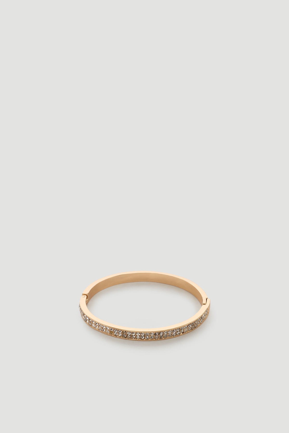 Gold-tone bracelet with rows of sparkling diamante stones for an elegant, refined accessory look