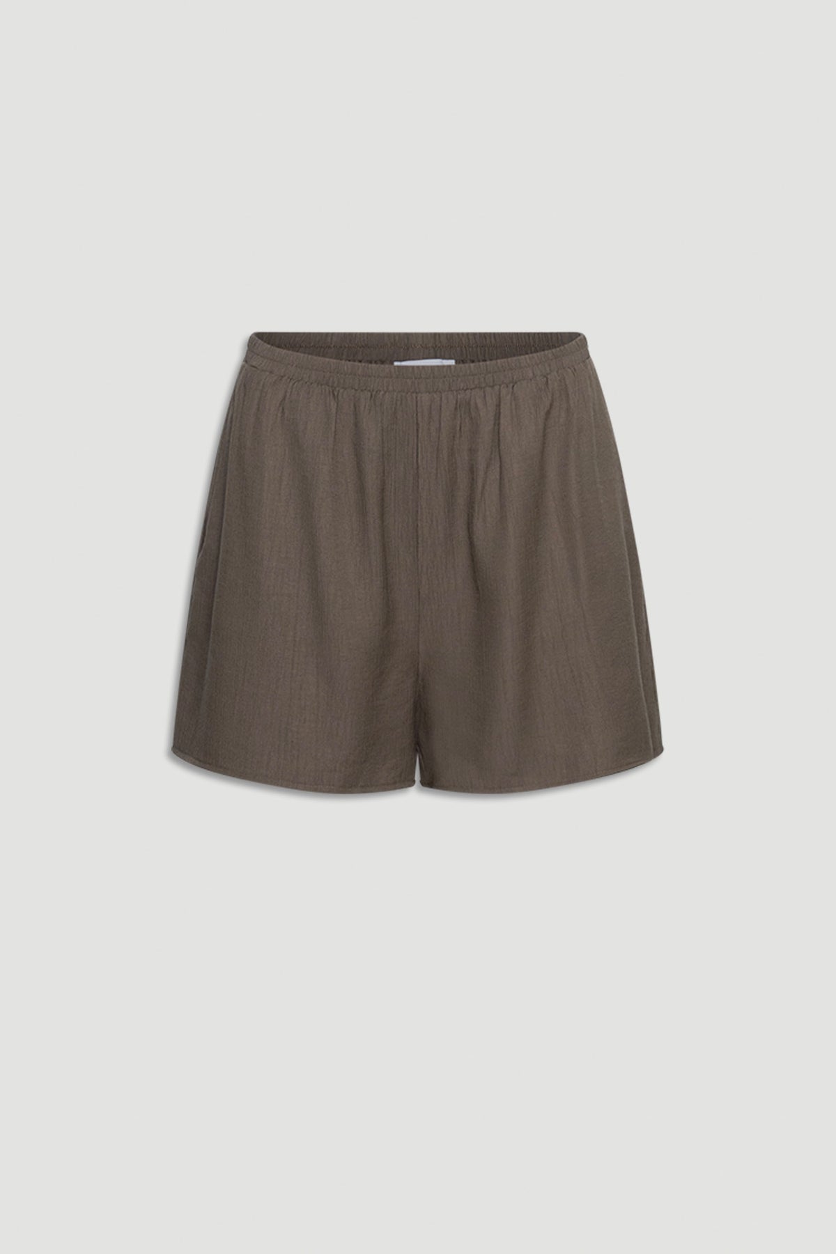 Brown textured shorts with a relaxed fit and elastic waistband, offering casual everyday comfort and style.