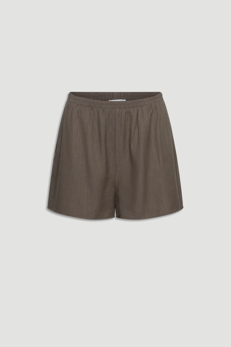 Brown textured shorts with a relaxed fit and elastic waistband, offering casual everyday comfort and style.
