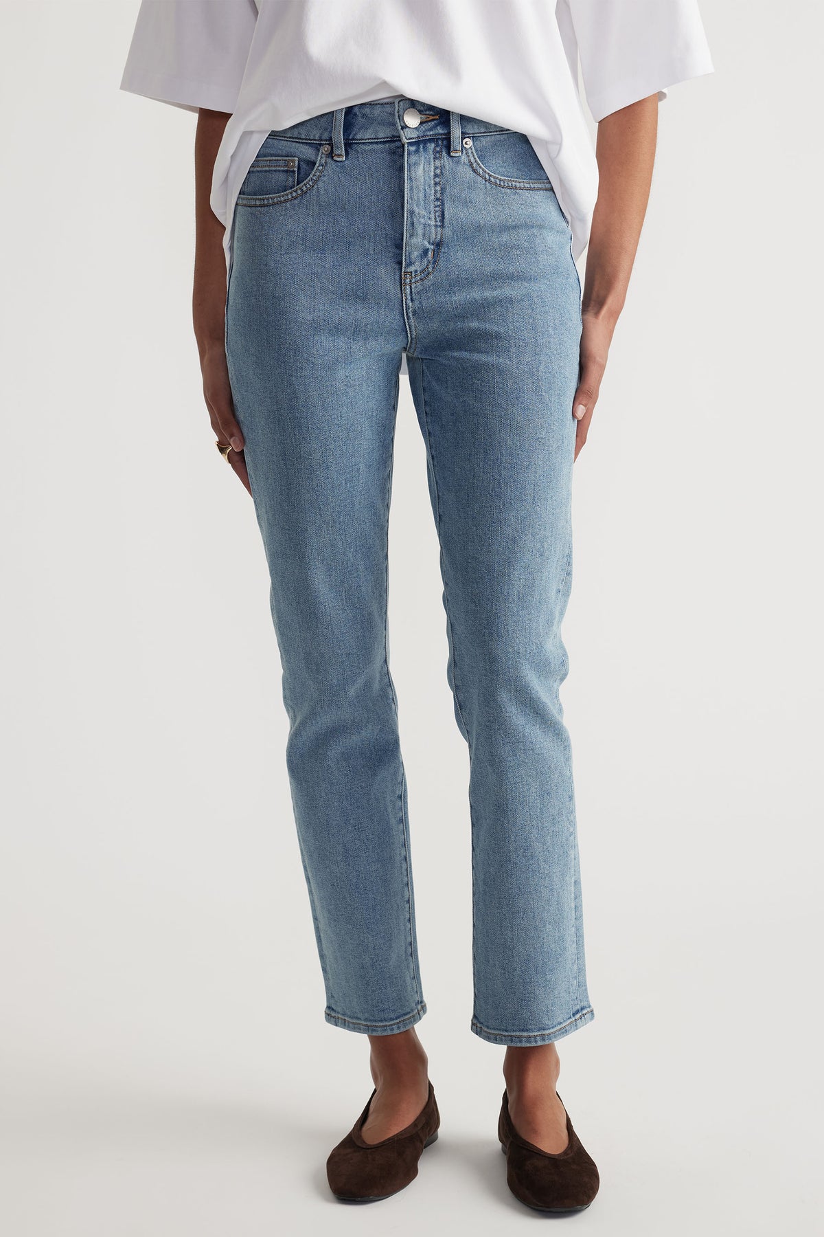 Front view of Becky Hemmed Straight Leg Jean in classic light blue denim styled simply by Decjuba Australian fashion brand