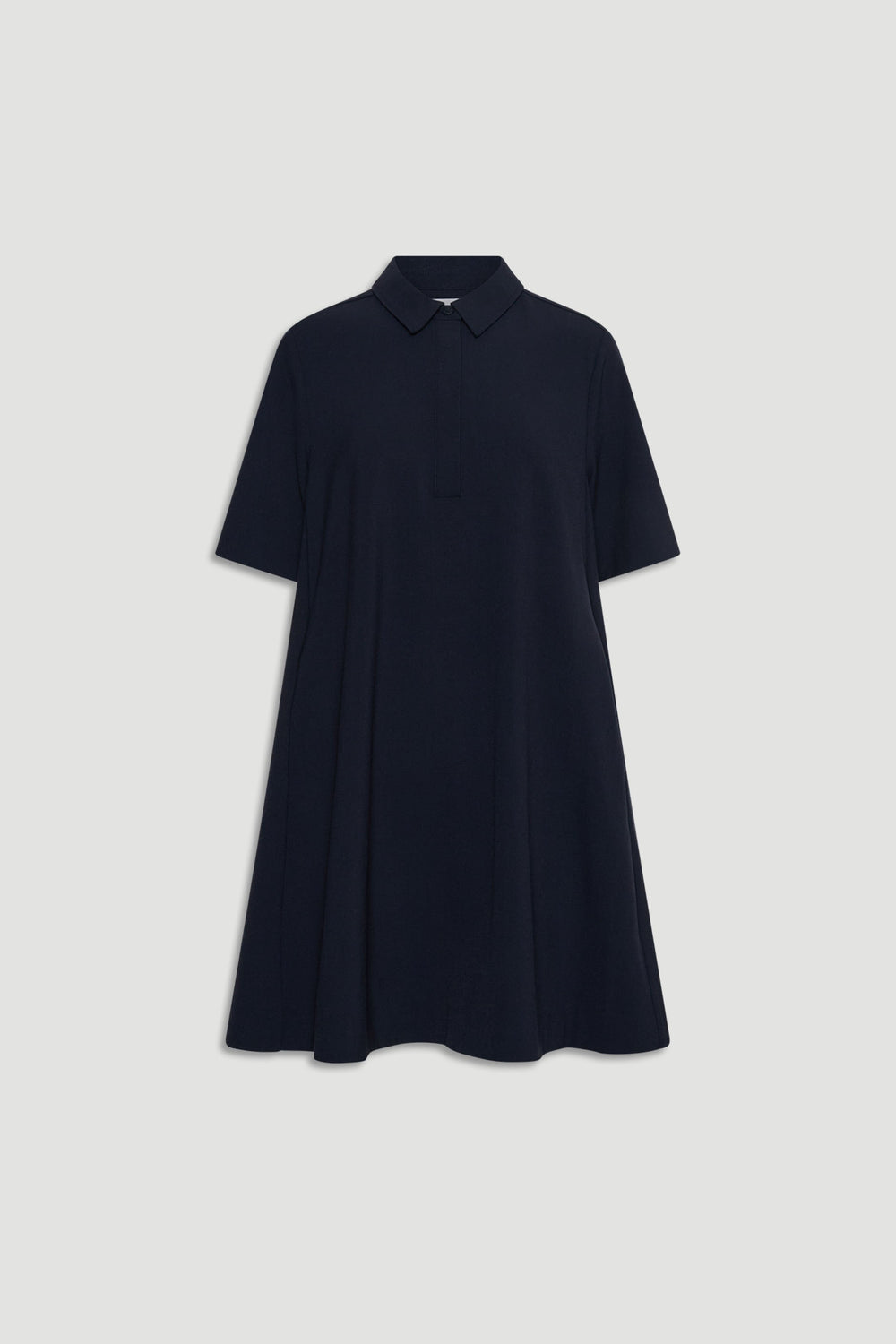 Classic navy swing dress with short sleeves and a polo collar for an easy, laid-back style.