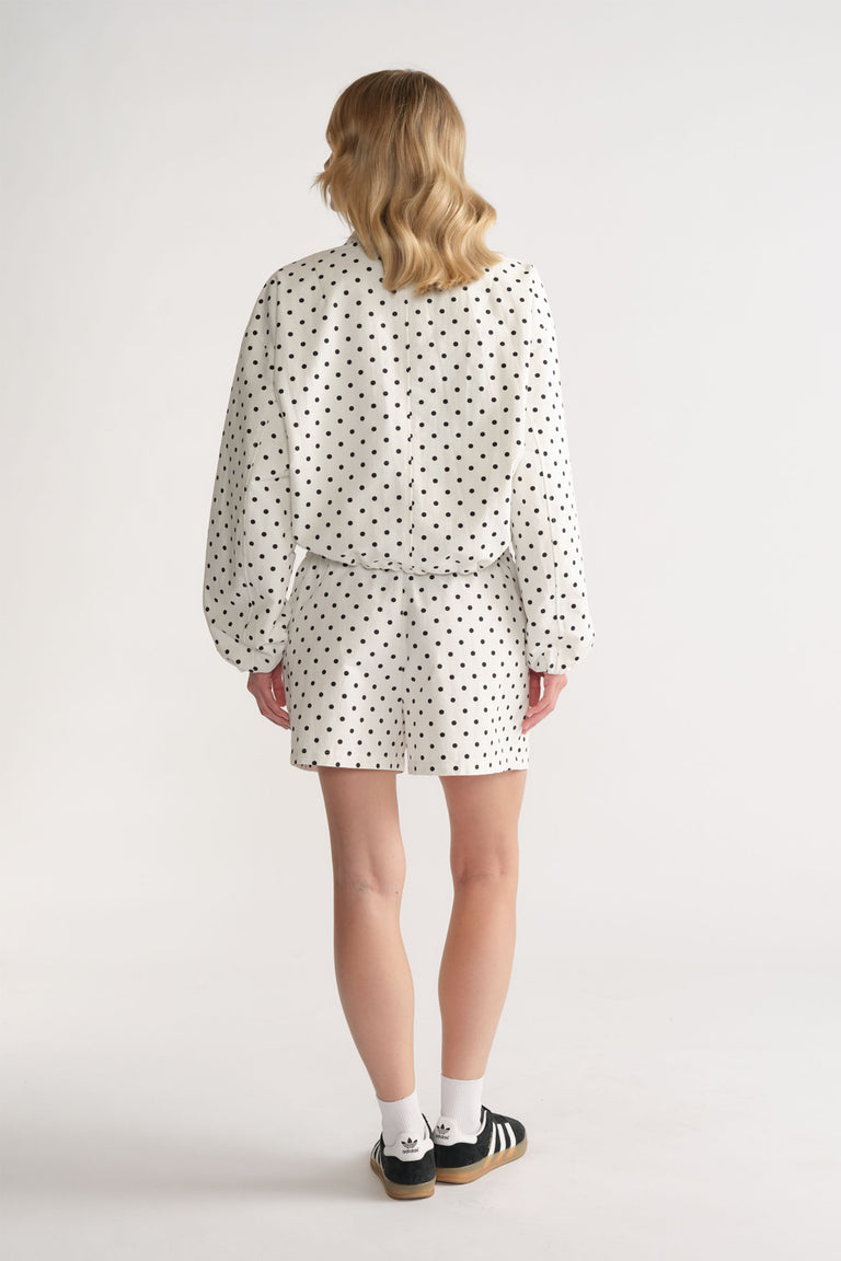 D-Luxe Polka Dot Short in white with black dots, relaxed fit styled from the back by DECJUBA Australian fashion brand