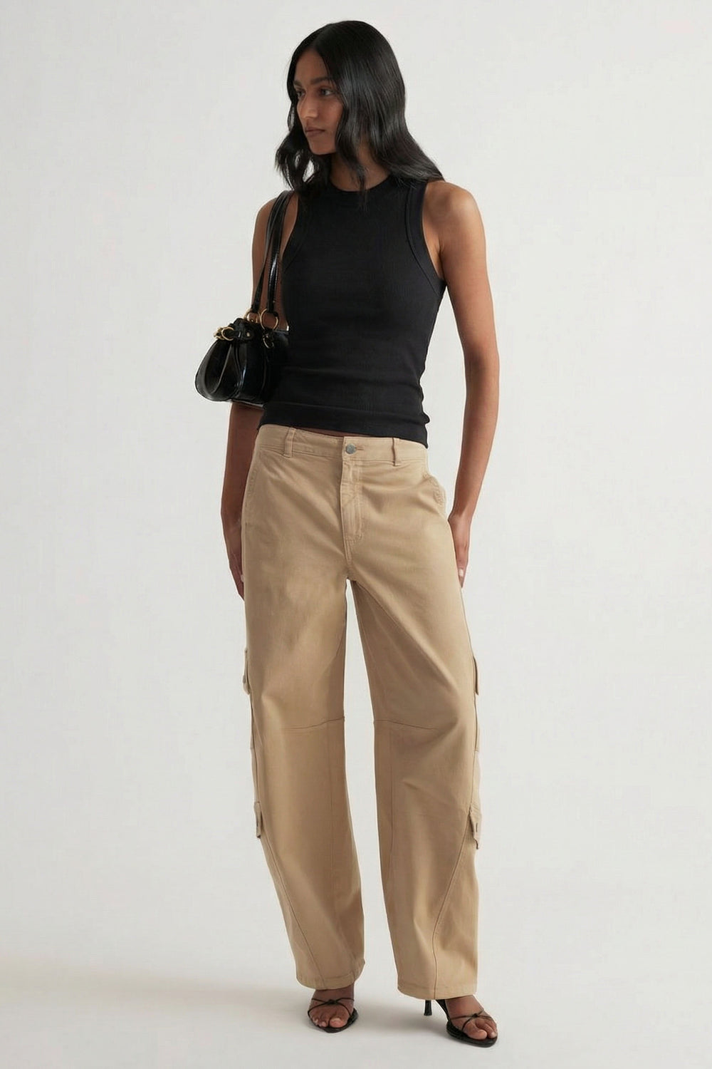 Charlotte Rib Tank in black paired with beige wide-leg pants and black sandals, styled for effortless everyday wear by DECJUBA Australian brand