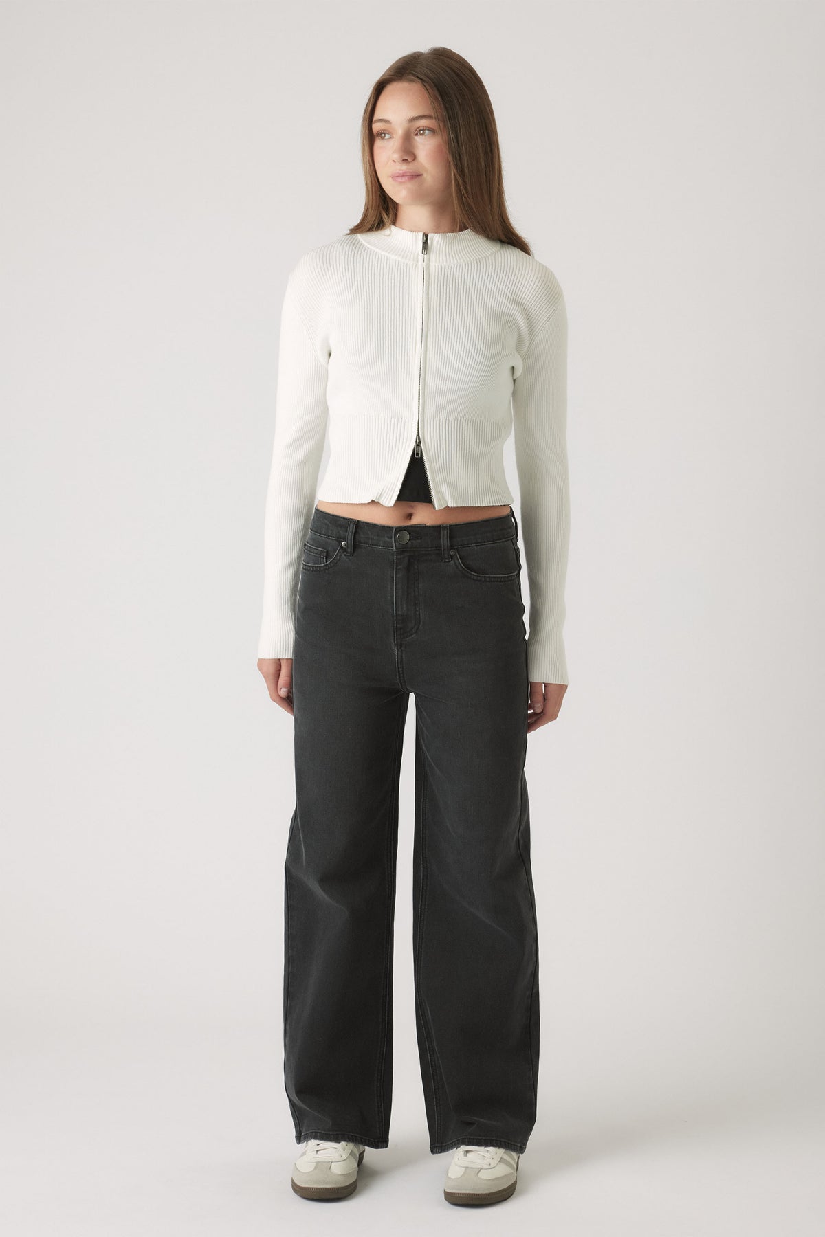 Girls Gigi Baggy Fit Jean in washed black denim with relaxed fit, styled with white zip-up knit by DECJUBA Australian brand
