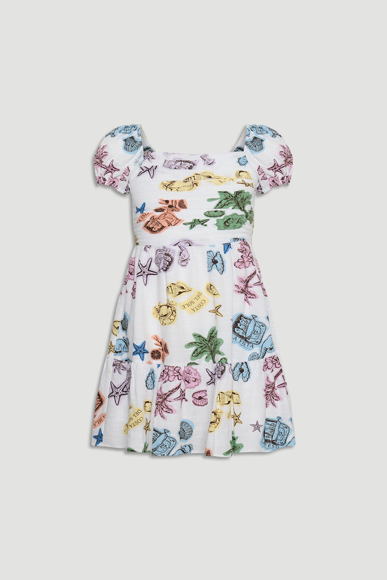 White mini dress with puff sleeves featuring colorful tropical and beach-themed prints in pastel shades