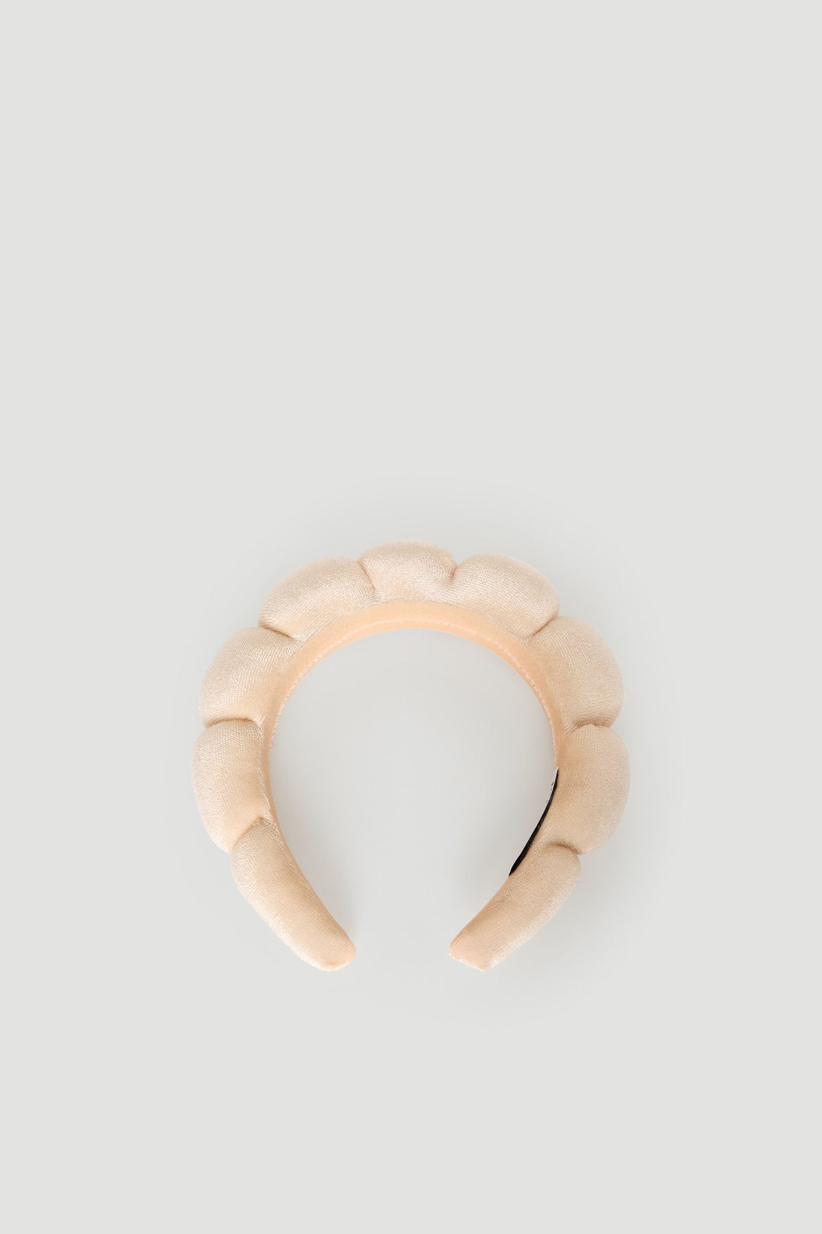 Soft padded headband for girls in light beige with a plush, petal-like design for stylish everyday wear
