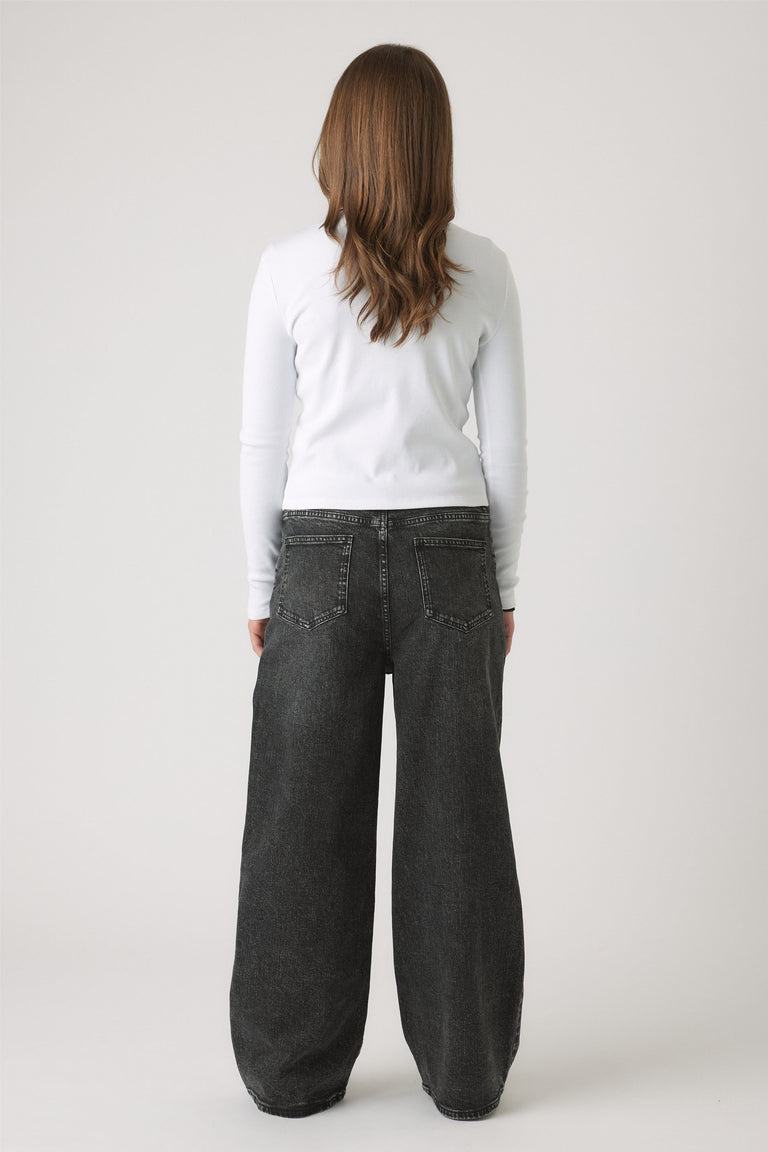 Back view of girl wearing Girls Riley Rib Long Sleeve in a portrait gallery shot, size 14 on model 166cm tall