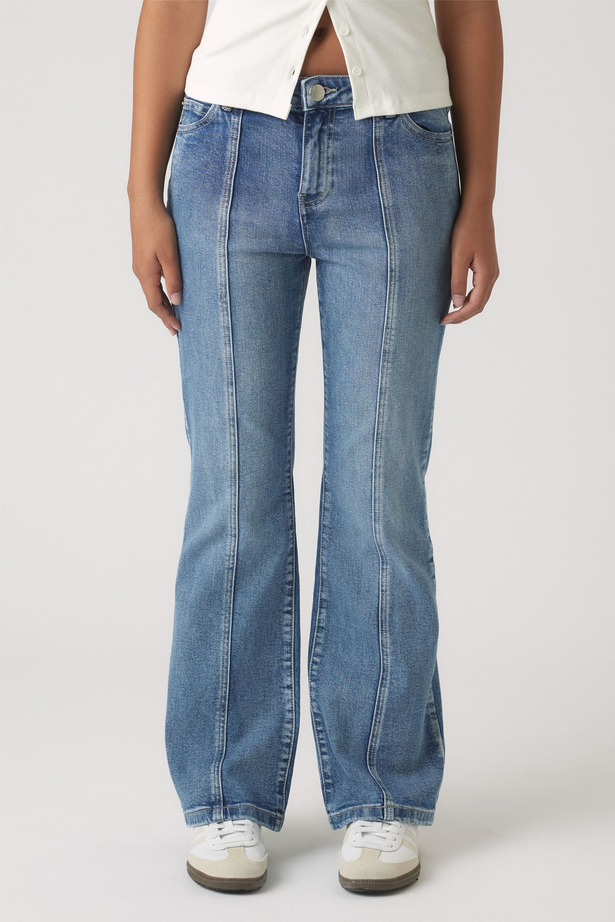 Girls Lucy Flare Jean in mid-blue denim with vertical seam detail and a relaxed flare by DECJUBA Australian fashion brand