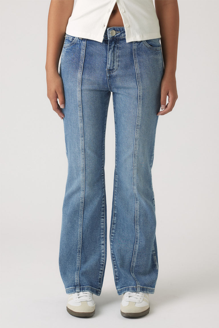 Girls Lucy Flare Jean in mid-blue denim with vertical seam detail and a relaxed flare by DECJUBA Australian fashion brand
