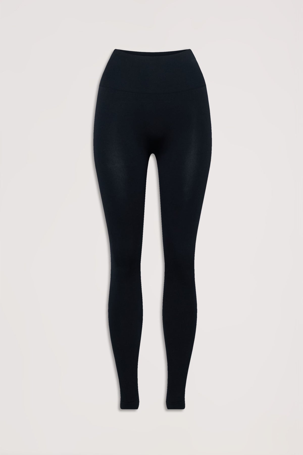 Black seamless leggings with a high-rise waist offering a sleek, comfortable fit for everyday wear.