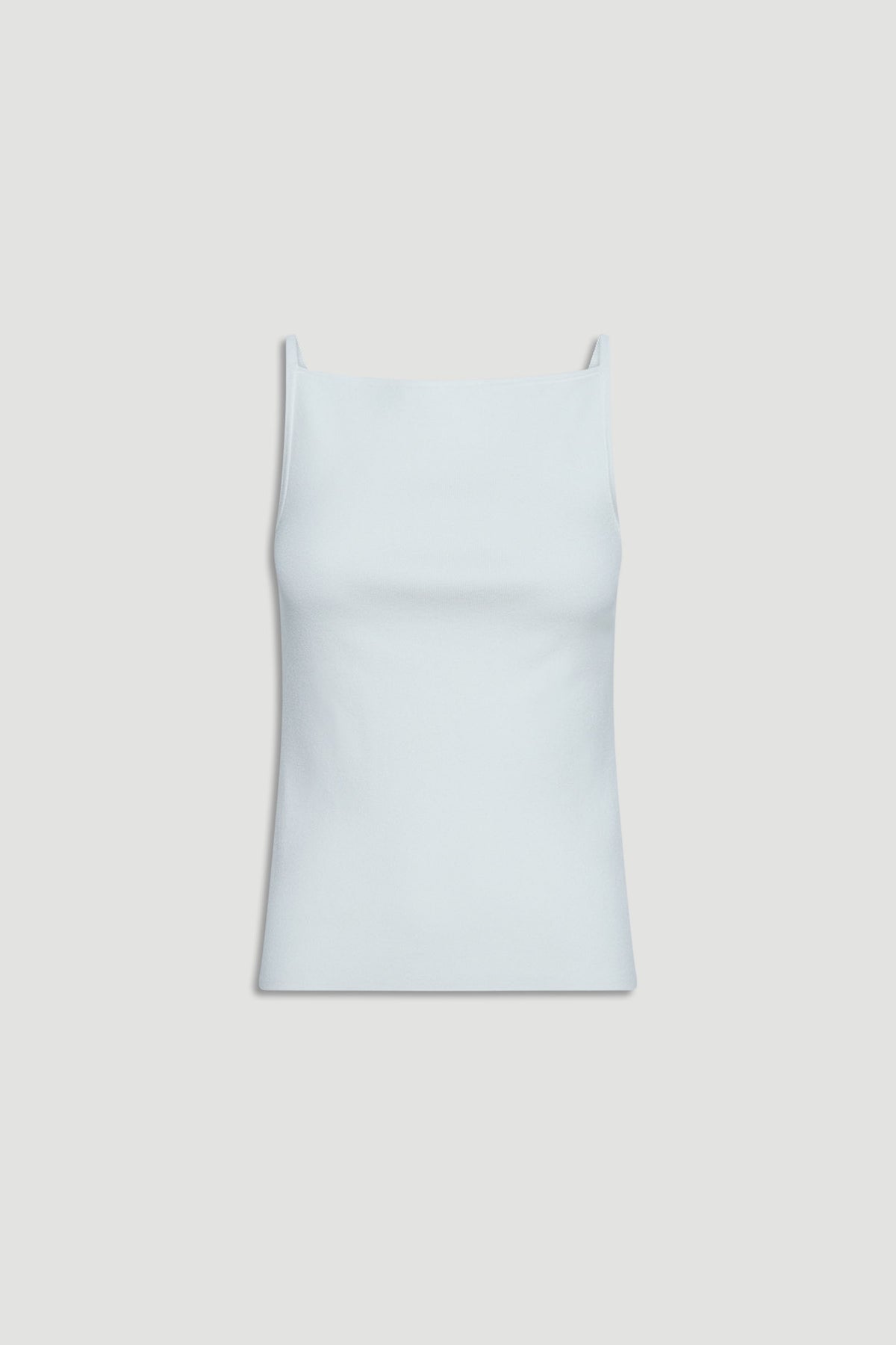 Soft white tank top with a square neckline and slim straps, offering a minimalist and versatile look.