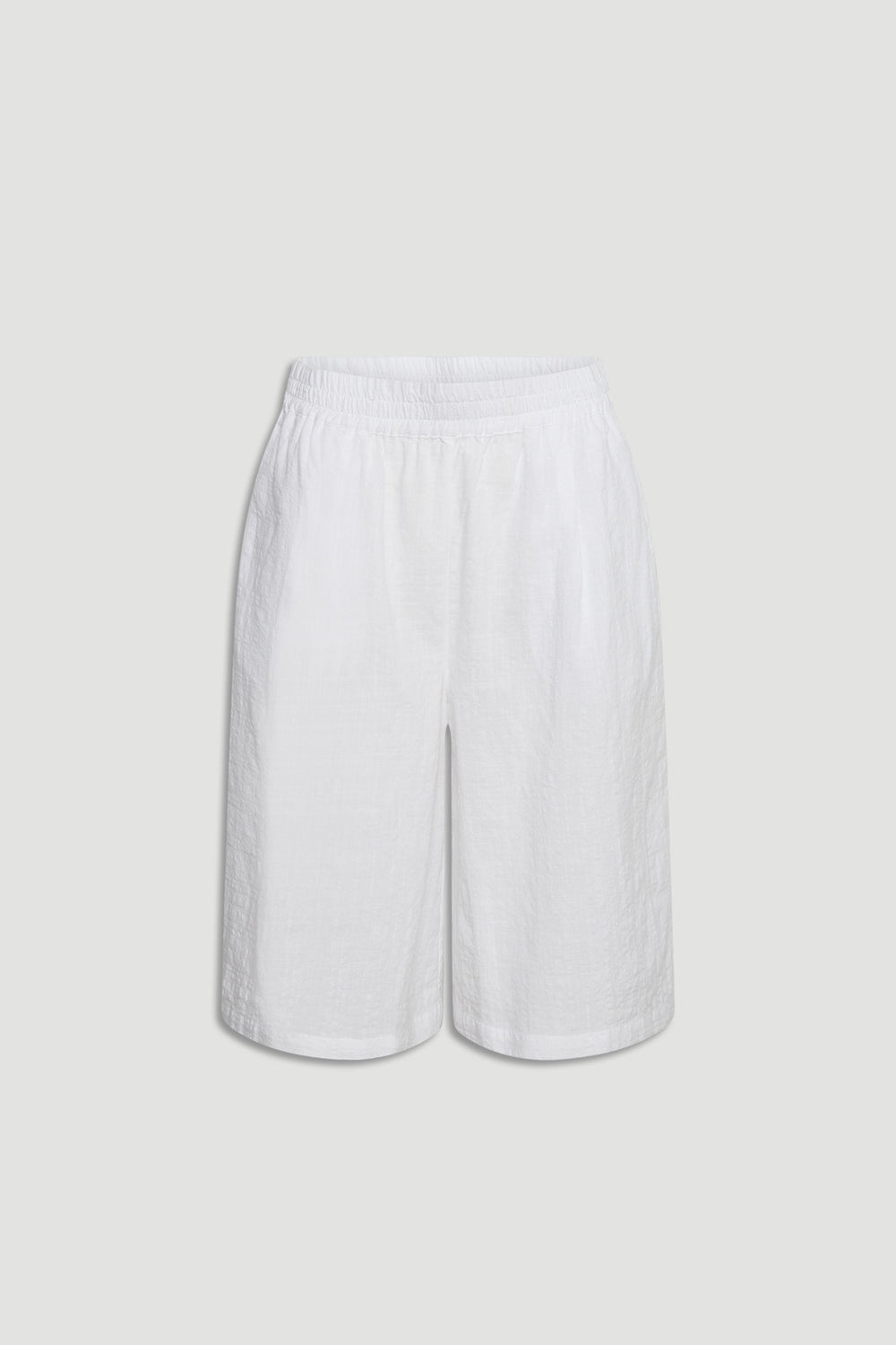 White relaxed fit Bermuda shorts with an elastic waistband, perfect for effortless everyday style.
