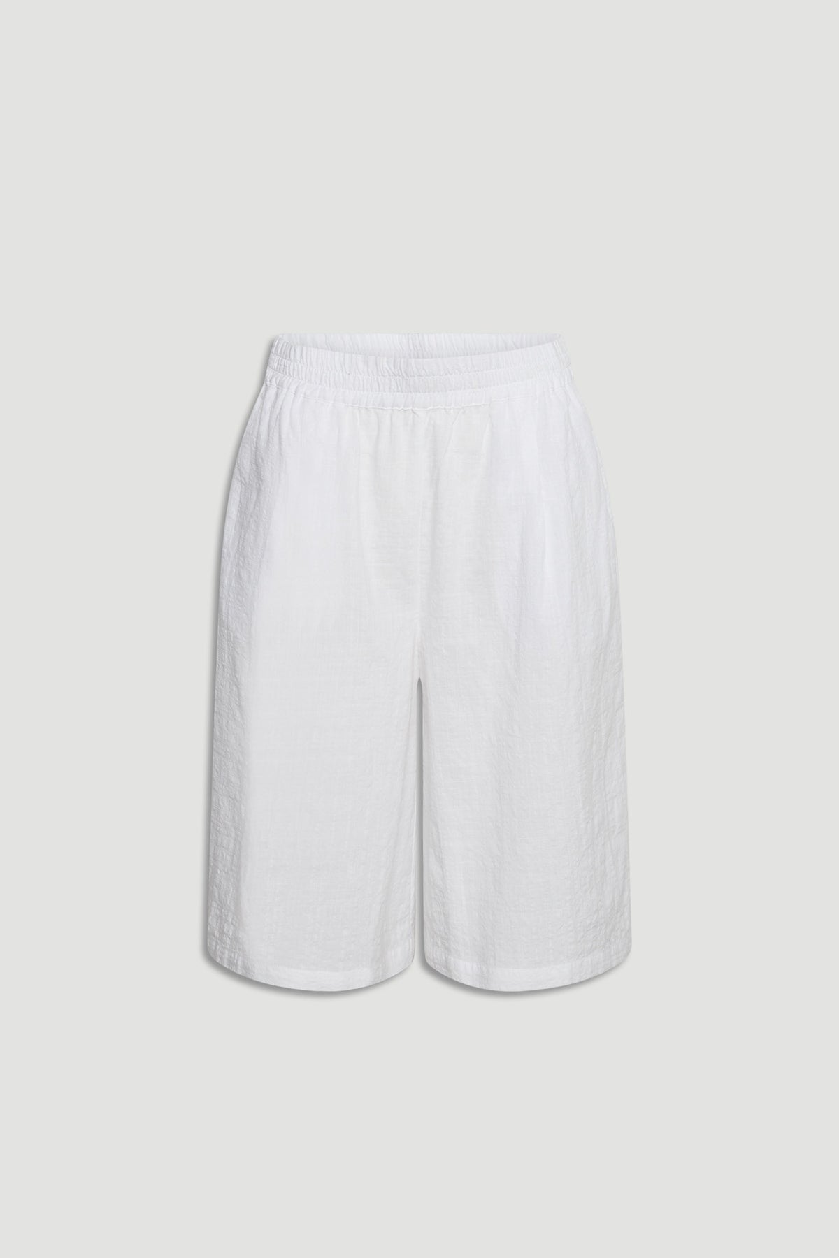 White relaxed fit Bermuda shorts with an elastic waistband, perfect for effortless everyday style.