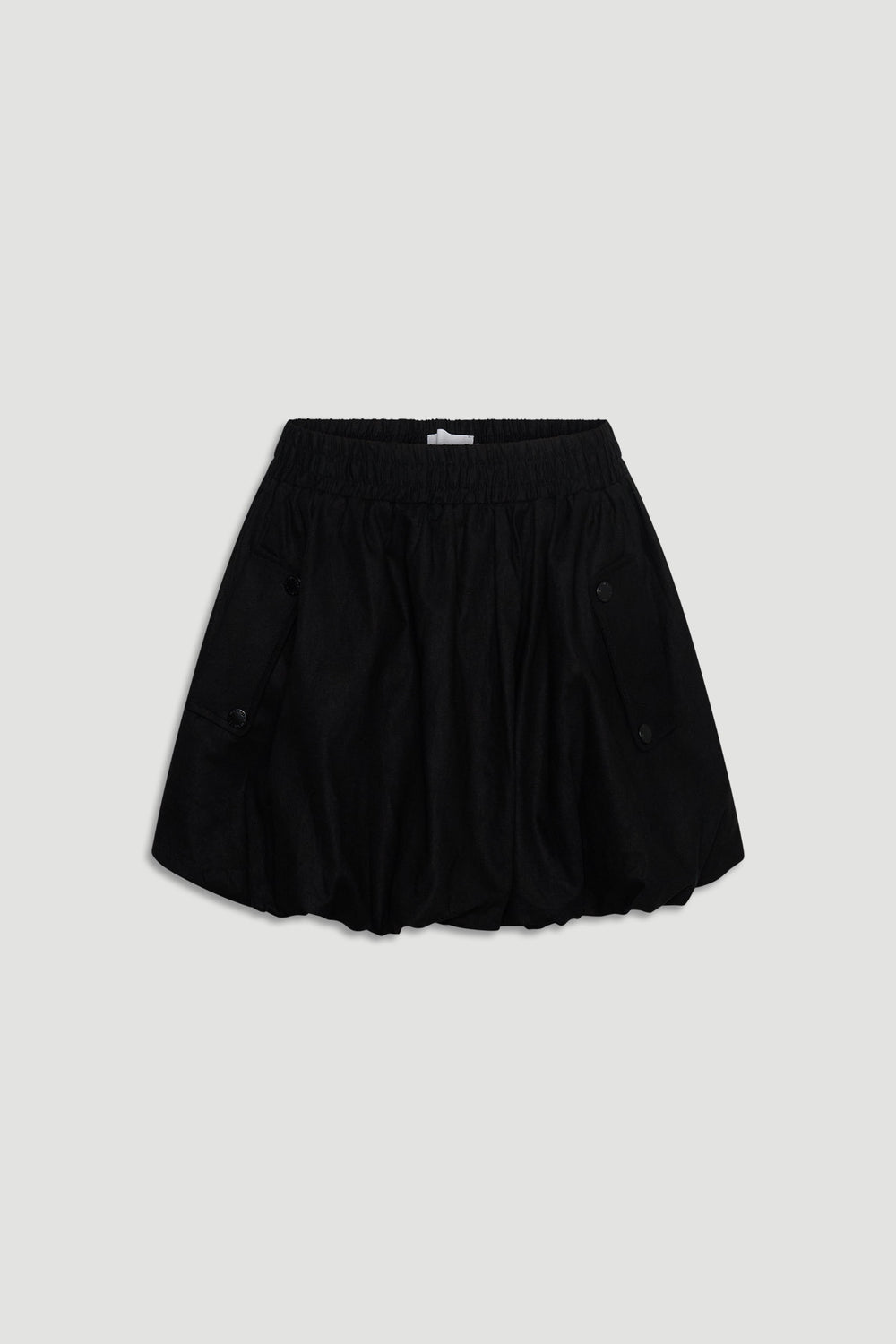 Black mini skirt with a bubble hem and elastic waistband, featuring buttoned side pockets for casual wear.