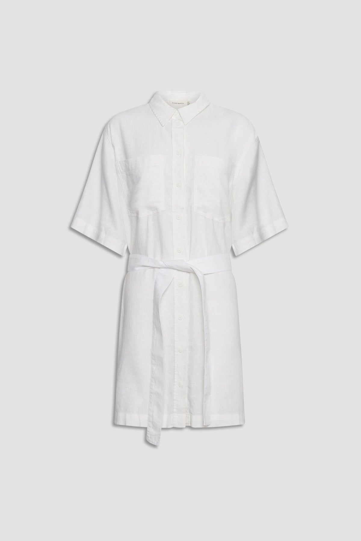 White linen blend short dress with button front, chest pockets, wide sleeves, and a matching fabric belt.