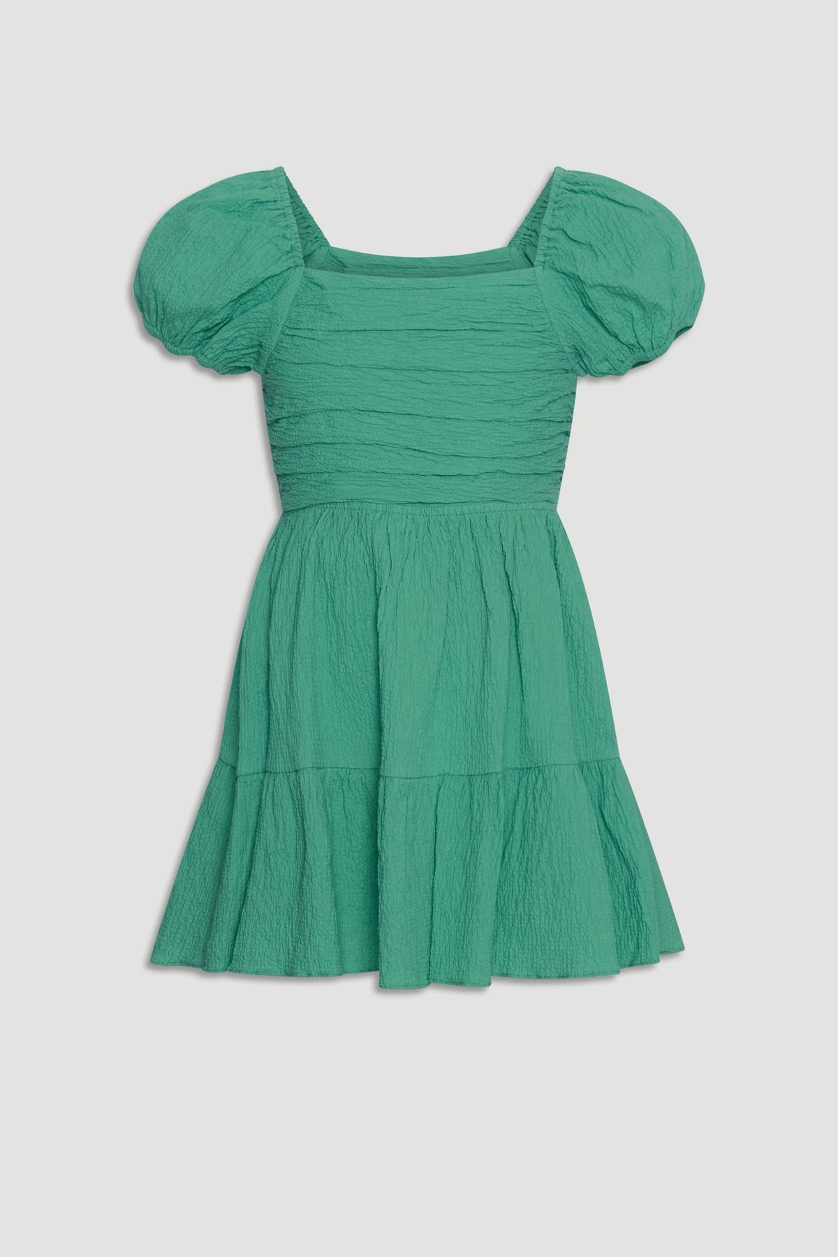 Girls textured mini dress in spring green with puff sleeves and a tiered skirt for playful everyday style.