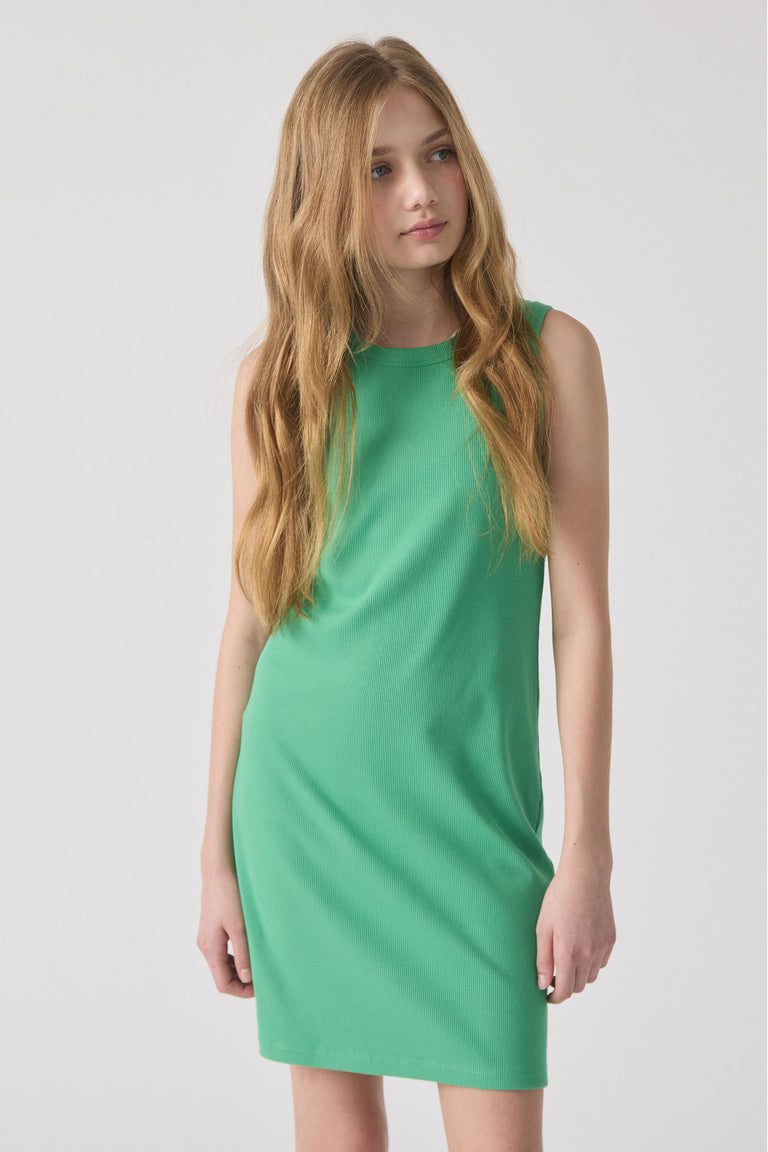 Girl wearing a spring green sleeveless ribbed tank dress with a relaxed fit and simple silhouette