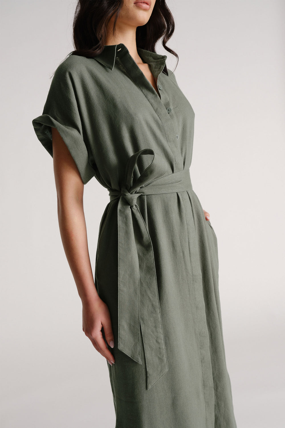 D-Luxe Linen Blend Midi Dress in olive green, portrait view highlighting soft linen fabric and tie waist detail.