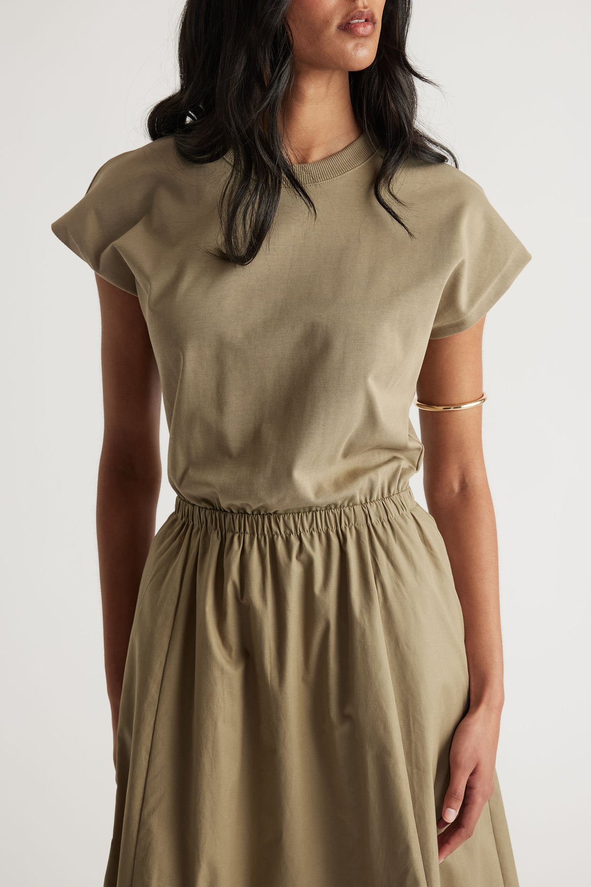Close-up portrait of woman wearing Sadie Spliced Maxi Dress with elastic waistband and short sleeves, gallery 2.