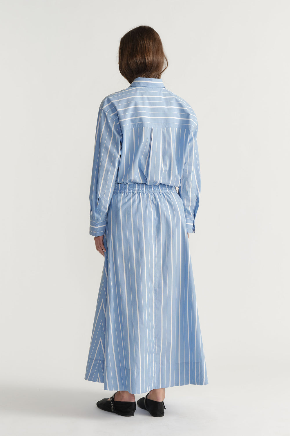 D-Luxe Poplin Stripe Skirt in portrait view with elasticated waistband and blue and white stripes, gallery position 3.