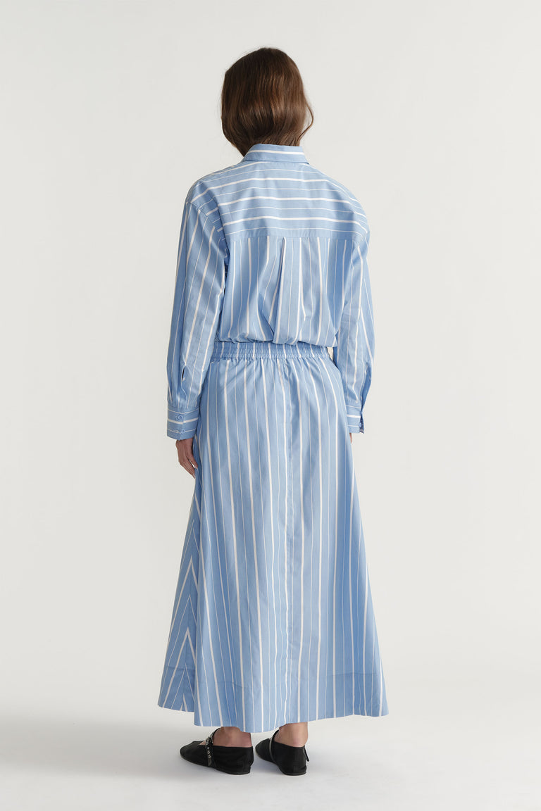 D-Luxe Poplin Stripe Skirt in portrait view with elasticated waistband and blue and white stripes, gallery position 3.