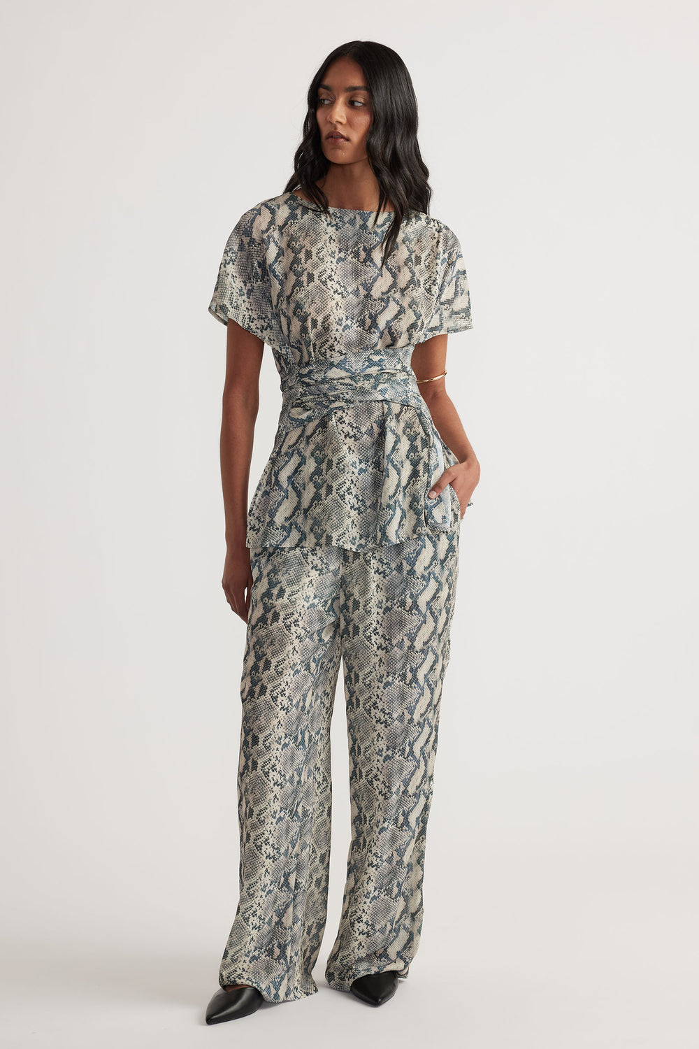 Model wearing Ilaria Yoryu Pant in gallery position 1, relaxed fit with elastic waistband and draw cord, portrait view