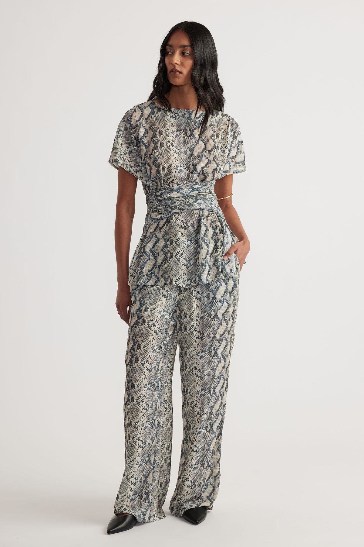 Model wearing Ilaria Yoryu Pant in gallery position 1, relaxed fit with elastic waistband and draw cord, portrait view