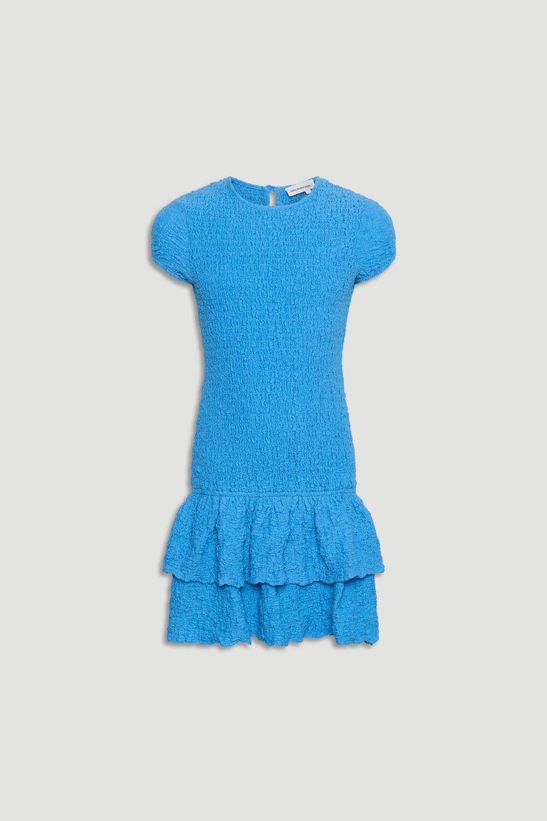 Bright blue shirred dress for girls with short sleeves and layered ruffle hem detail in textured fabric