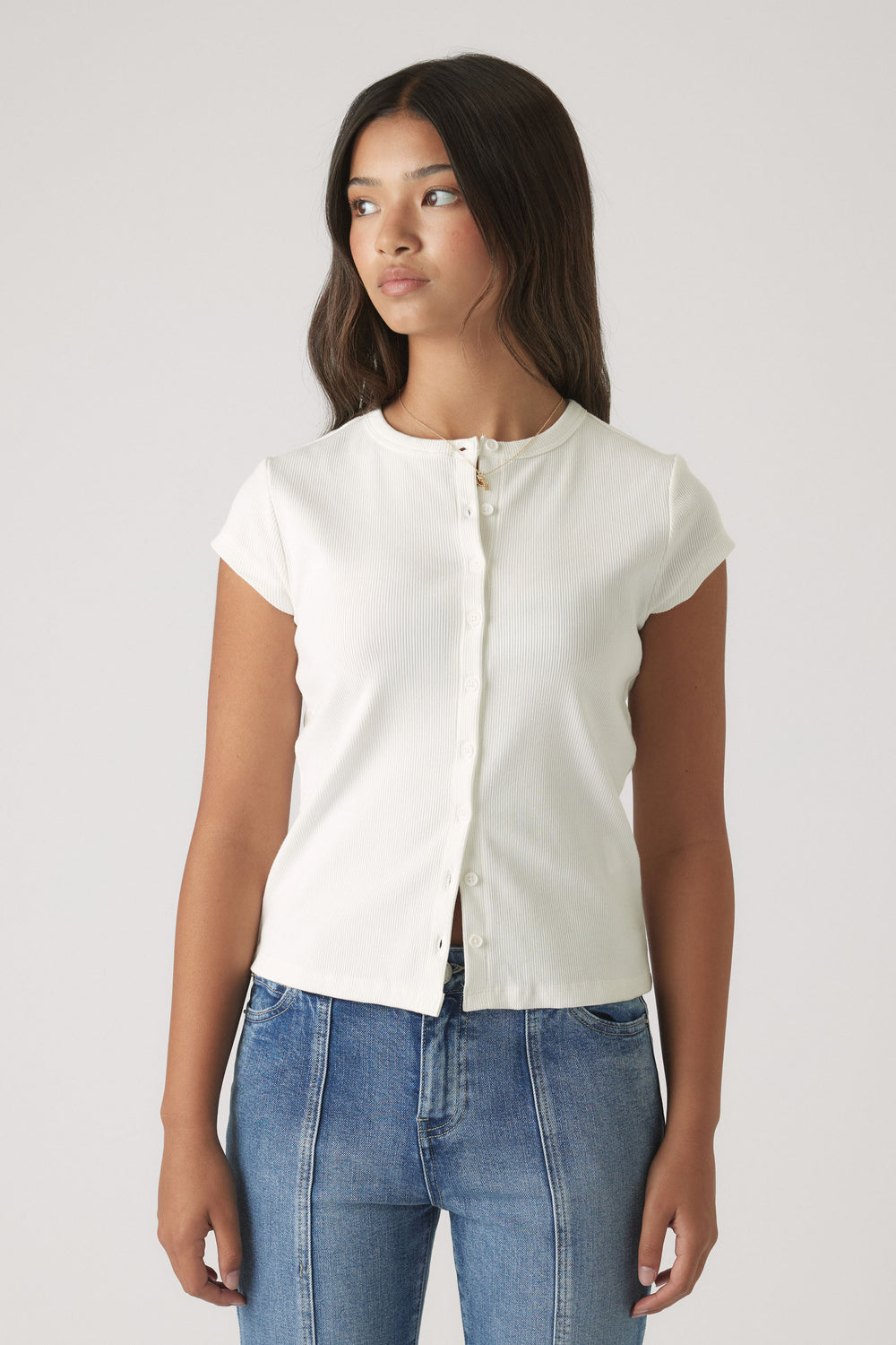 Girls Riley Rib T-Shirt in soft white ribbed fabric with front buttons, paired with blue denim jeans by DECJUBA Australian brand